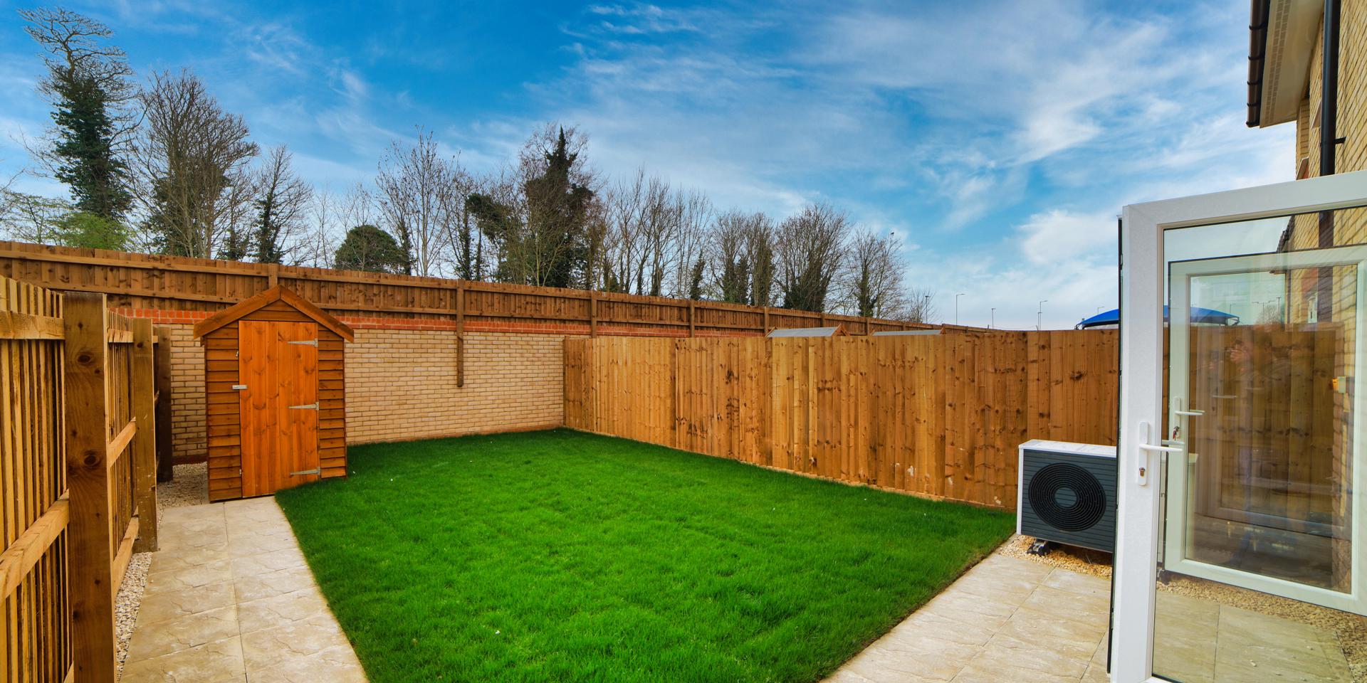 There is a path leading off the patio area to the shed