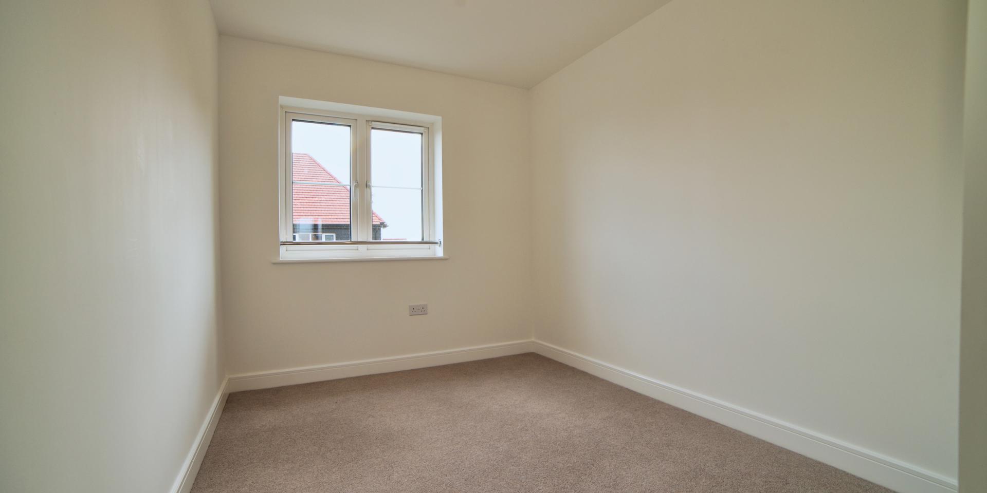 Bedroom 2 is large enough for 2 single beds