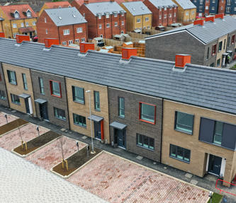 A row of shared ownership houses in Hemel Hempstead. They have their own drive.