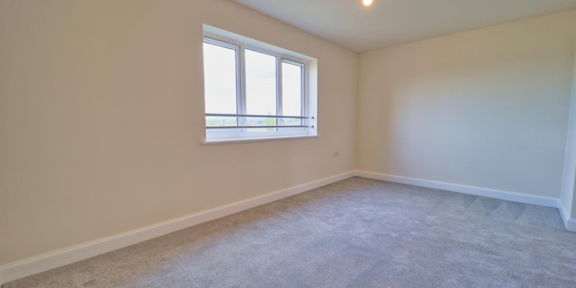 Bedroom 2 has a small store cupboard and fits a double or 2 single beds