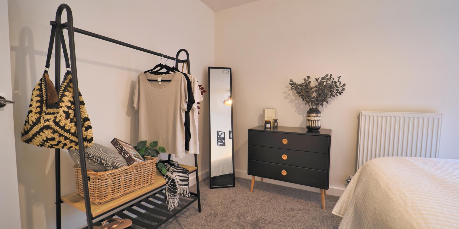 Bedroom 2 is a double bedroom and the photo show a freestanding clothes rail