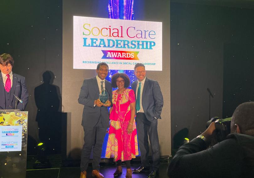 Francis Zvoma Collecting His Award