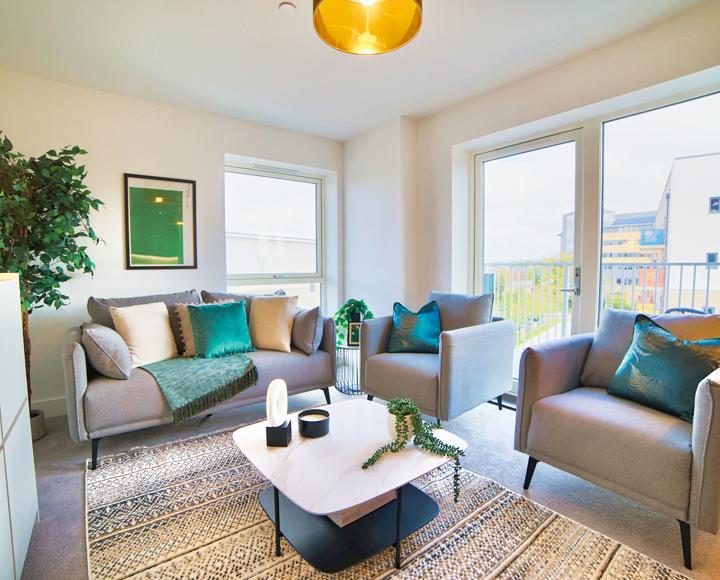 Spacious living room which is open plan with the dining area and kitchen
