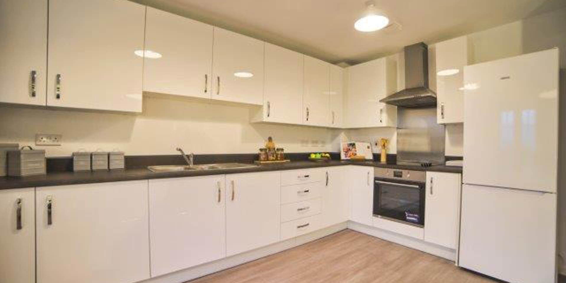 A picture of the fully fitted kitchen