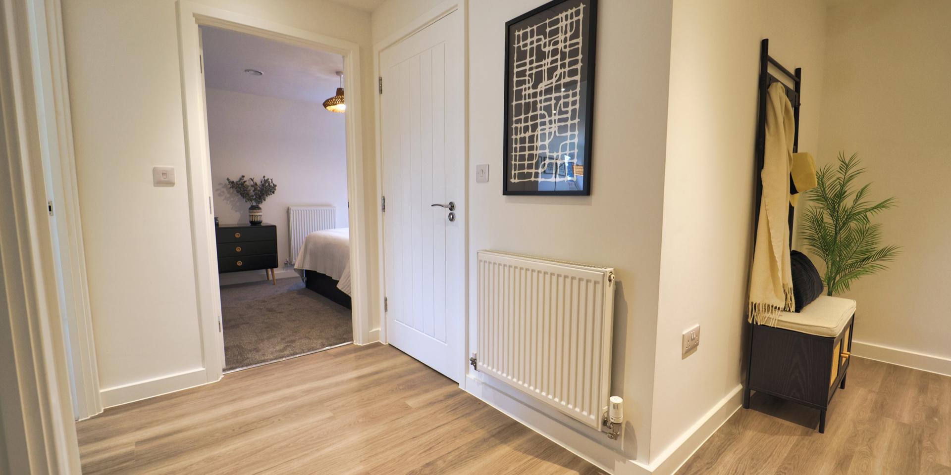 There is vinyl flooring in the hallway