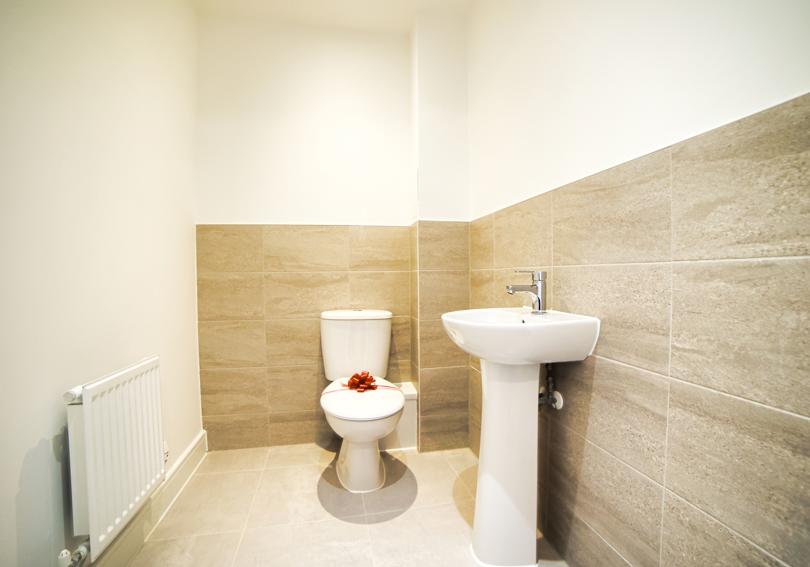 The white downstairs cloakroom