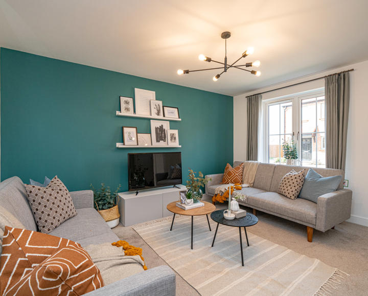 A living room with 2 sofas
