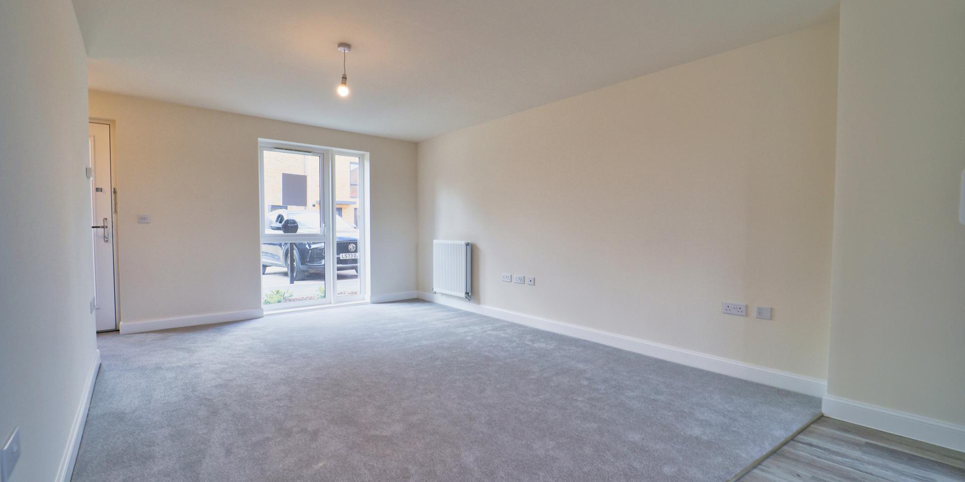 The living/dining/kitchen area is all open plan