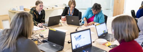 VoiceBox & RVSP members reviewing Hightown's website