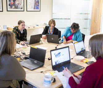 VoiceBox & RVSP members reviewing Hightown's website
