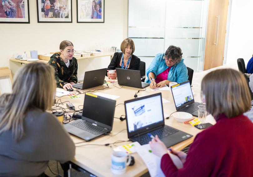 VoiceBox & RVSP members reviewing Hightown's website