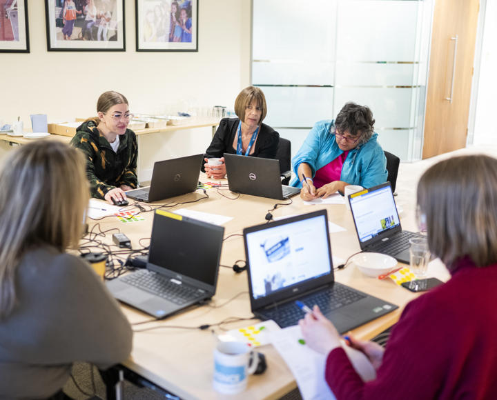 VoiceBox & RVSP members reviewing Hightown's website