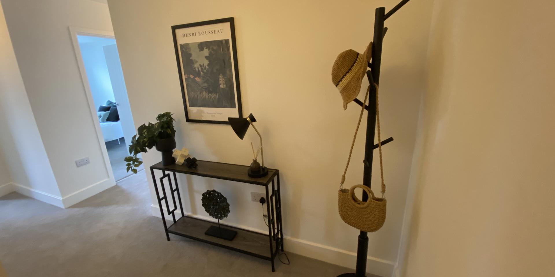 Hallway with console table and coat stand