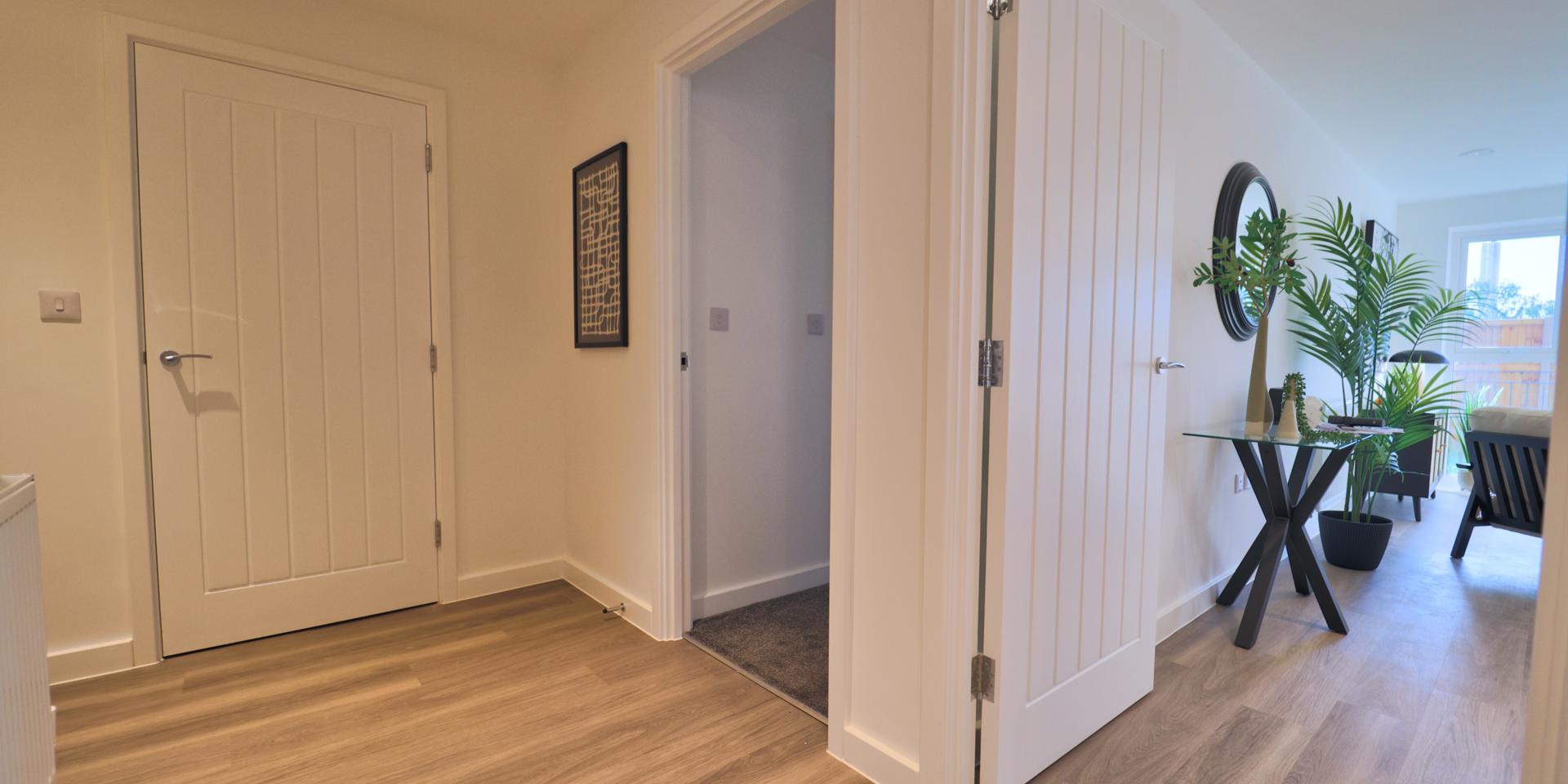 There is a storage cupboard in the hallway
