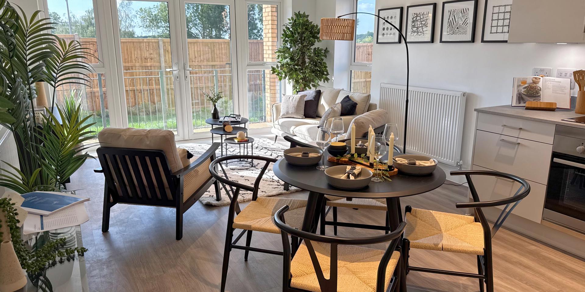 The living area is open plan with the kitchen, dining area and living room