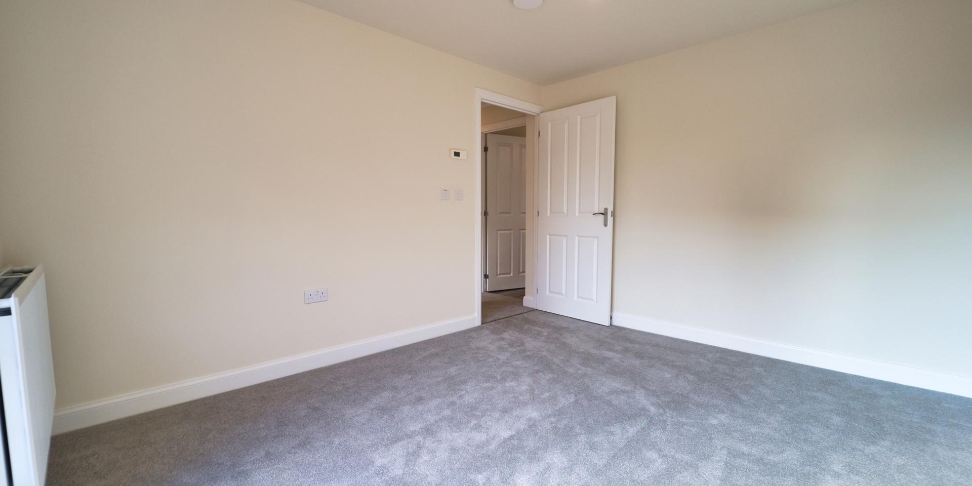 The carpet is a light grey