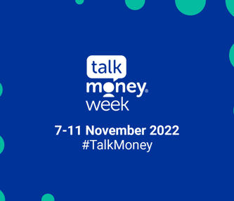 A sign for talk money week 2022