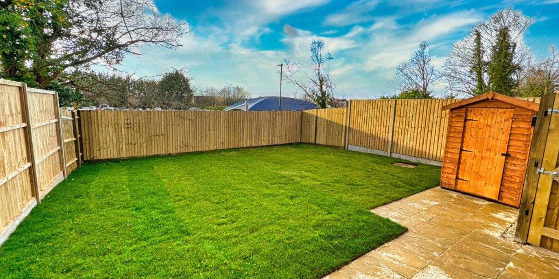 View of the garden and patio area from the back of the house