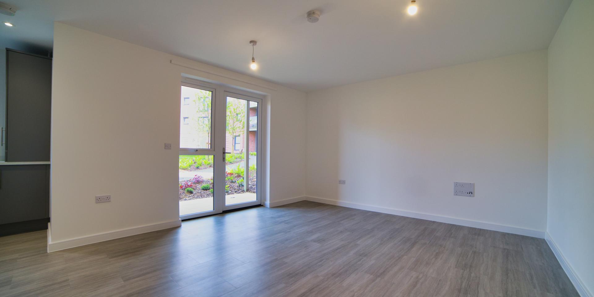 The kitchen is semi-open plan to the living/dining room