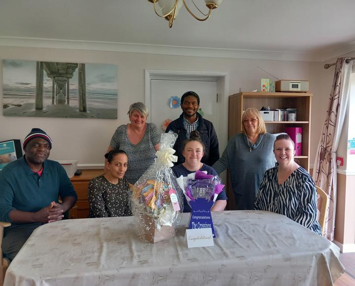 A care and supported housing scheme celebrating being rated 'excellent' by the local authority