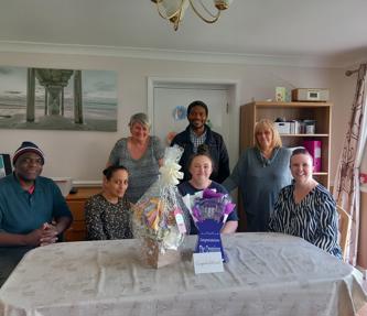 A care and supported housing scheme celebrating being rated 'excellent' by the local authority