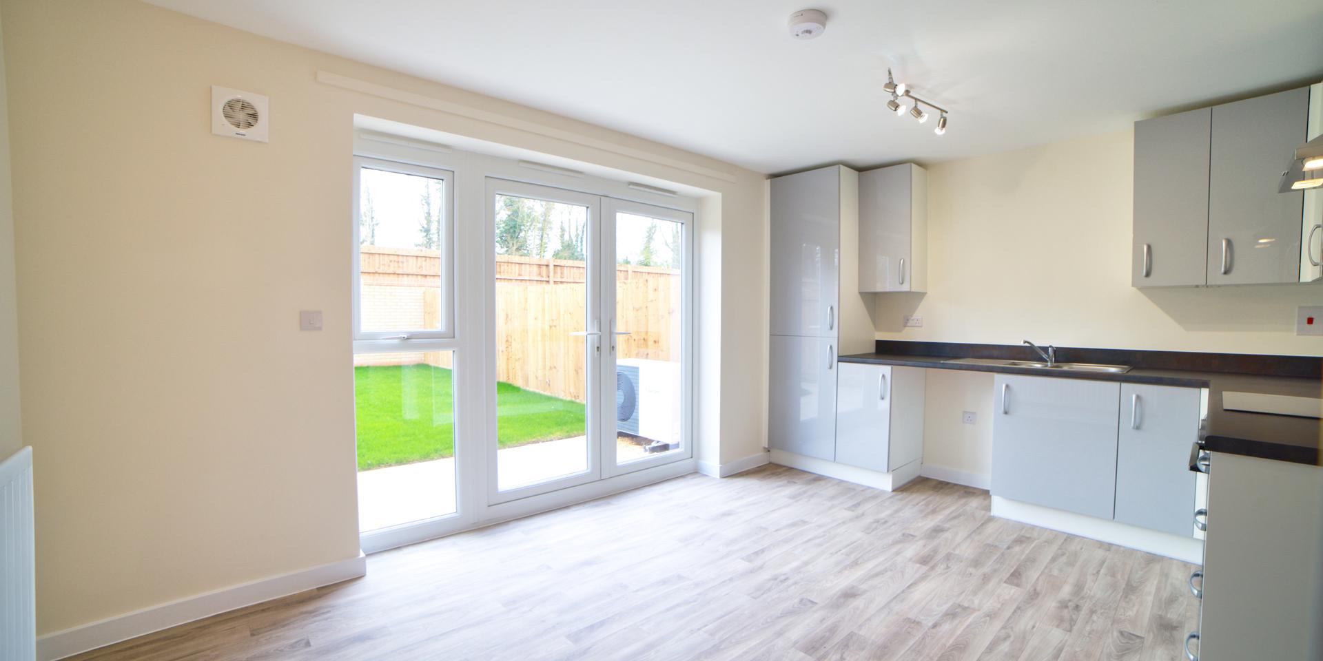 The kitchen has double patio doors with lead out into the south west facing garden