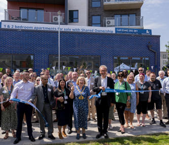 Mayor of Dacorum cutting ribbon with group of people