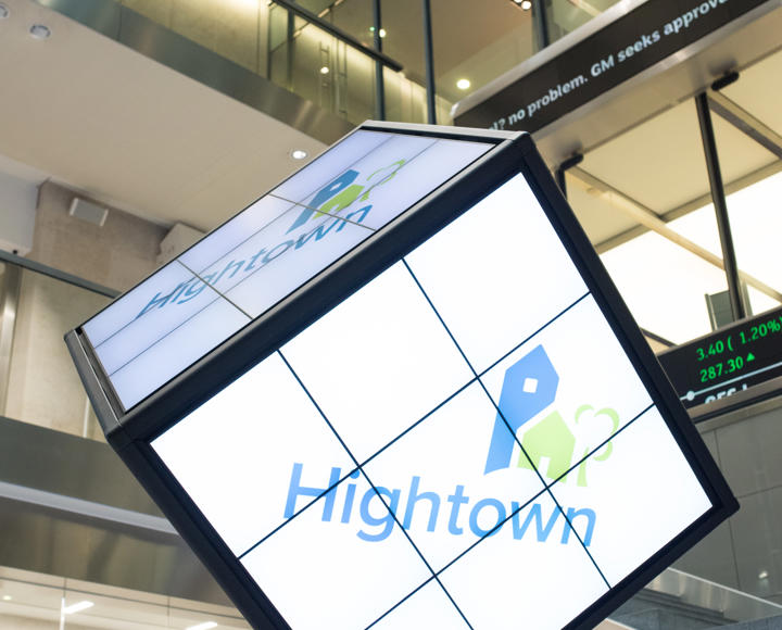 Hightown logo in a cube inside the London stock exchange