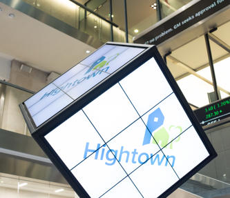 Hightown logo in a cube inside the London stock exchange