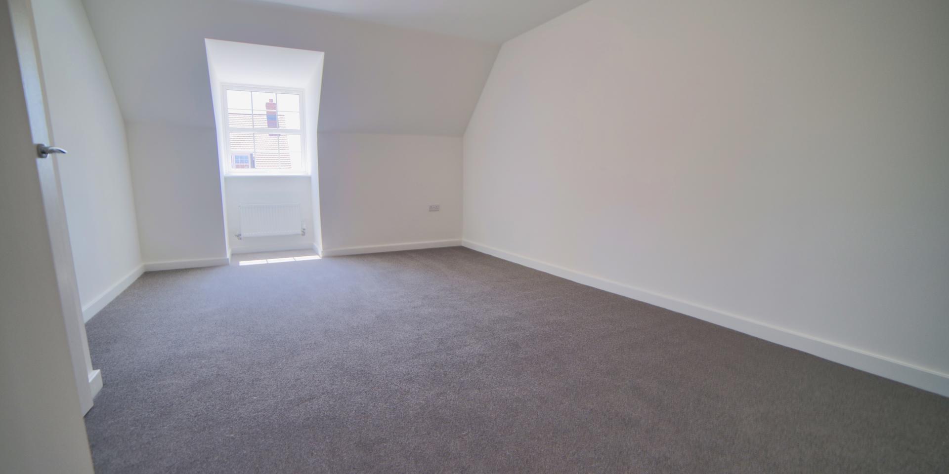 Bedroom 2 has a dormer window