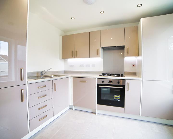 The high gloss, fully fitted kitchen with integrated appliances