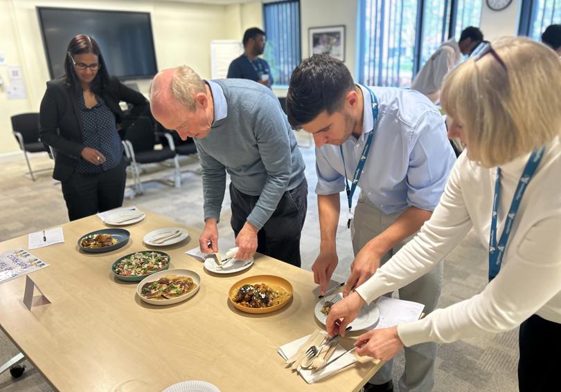 Former CEO David Bogle and Head of C&SH - Homelessness & Mental Health, Spiros Georgiou judging the cook off