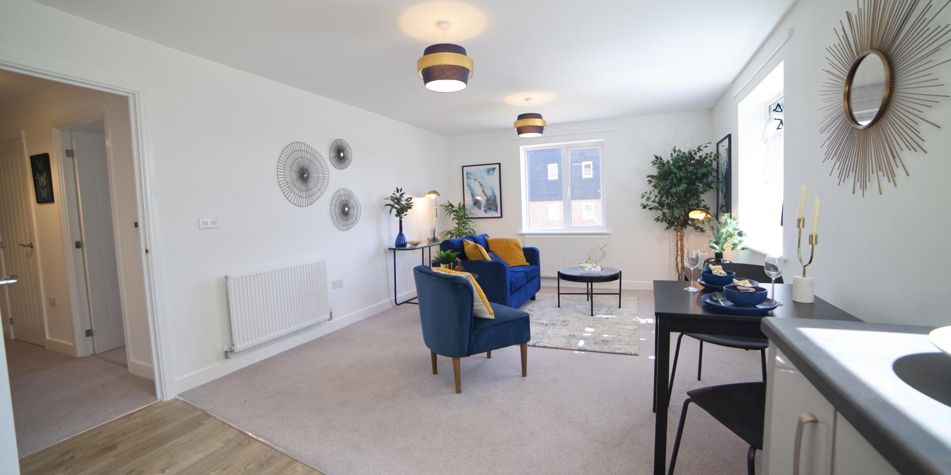 Leading off the kitchen/dining/living room is the hallway to the bedroom and bathroom