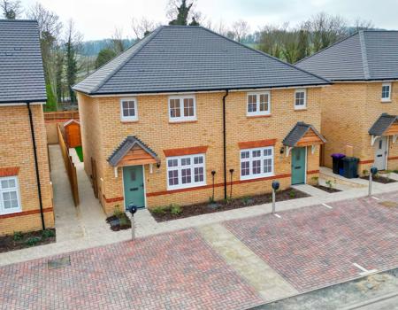 The property comes with 2 parking spaces and EVC