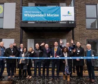 Various people who were involved in the development of Whippendell Marine standing outside