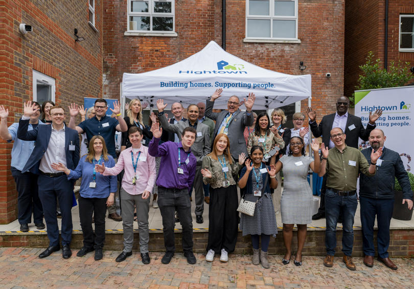 Hightown staff waving outside of Alexandra Road during the opening event
