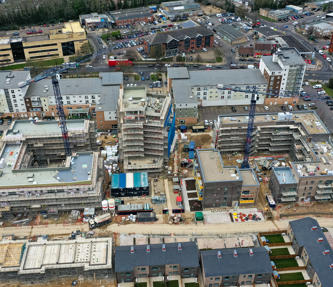 Aerial view from a drone of a new development; flats are being built