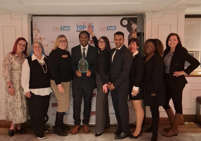 Francis Zvoma With His Managers At The Award Ceremony