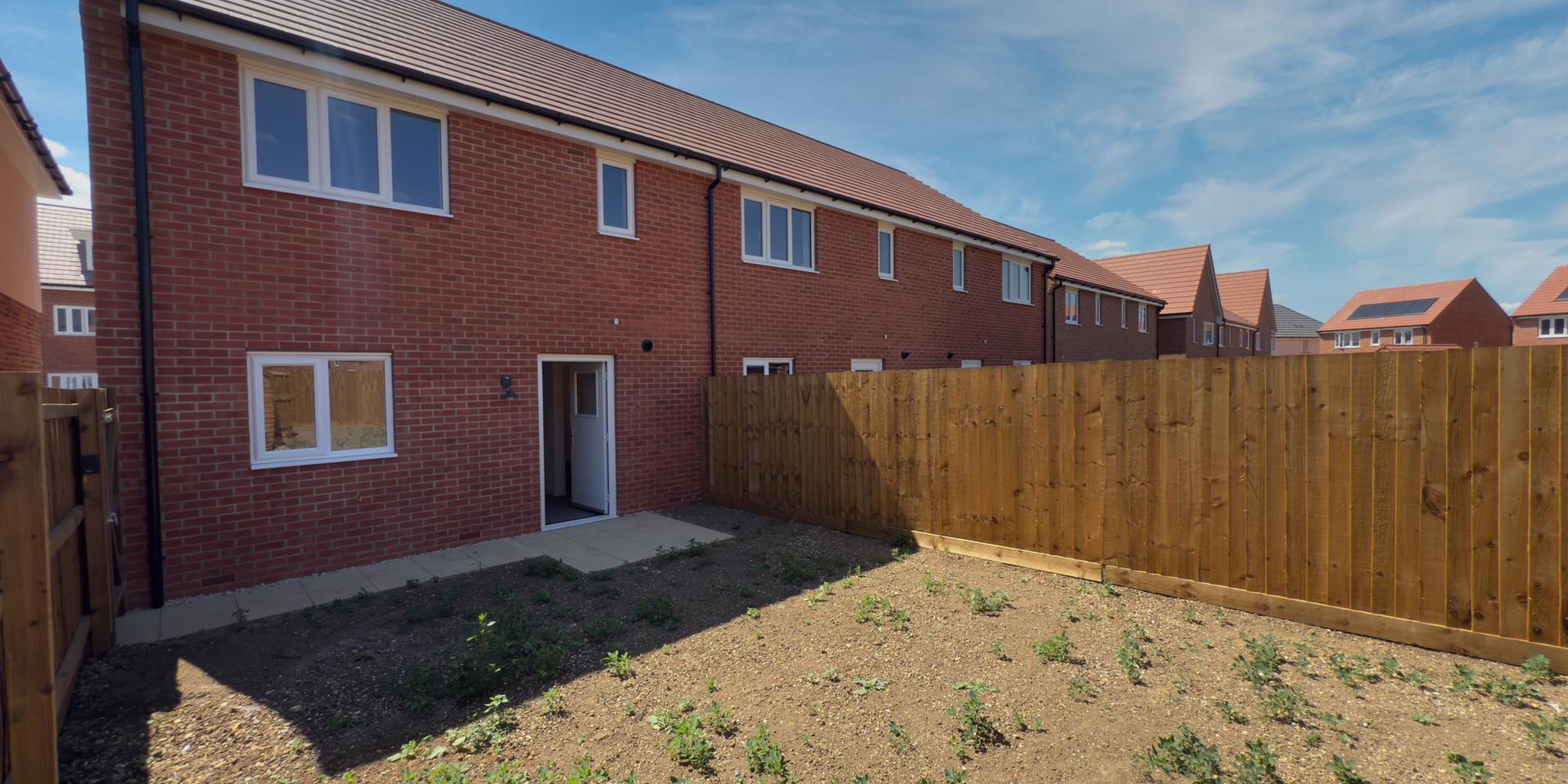 There is a small patio area in the back garden which will also be turfed