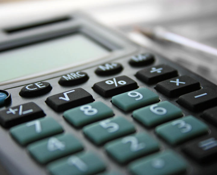 A calculator, signifying that there are affordable options for paying rent arrears