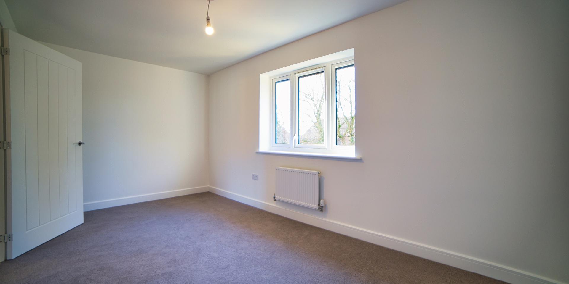 Large Window In Second Bedroom