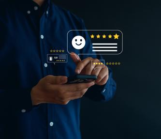 Man using mobile phone showing reviews